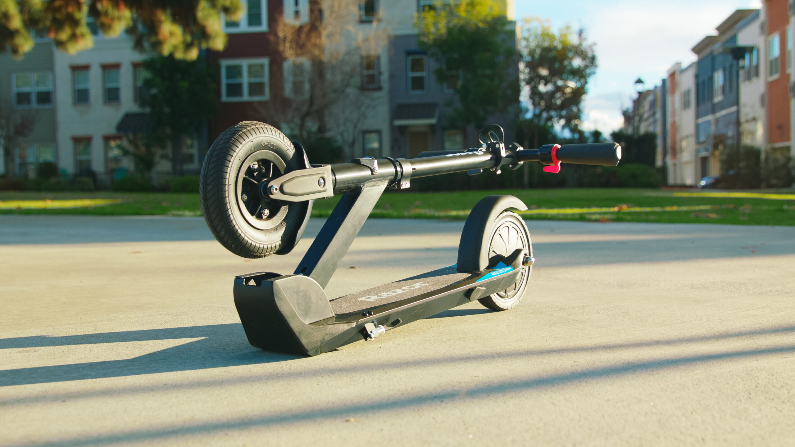 Lightweight Scooter Air in folded position sat on the ground outside